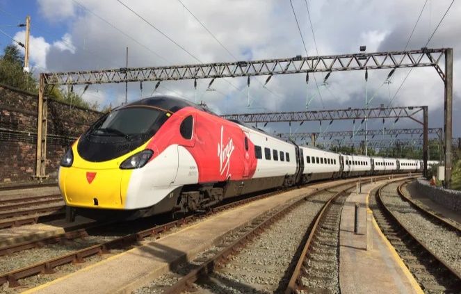 Image showing a newly re-liveried Virgin Trains Pendolino
