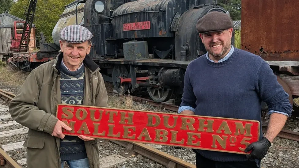 Tanfield Railway Trust chairman Derek Smith accepted Malleable's name plate from Beamish Museum director of transport Paul Jarmanailway