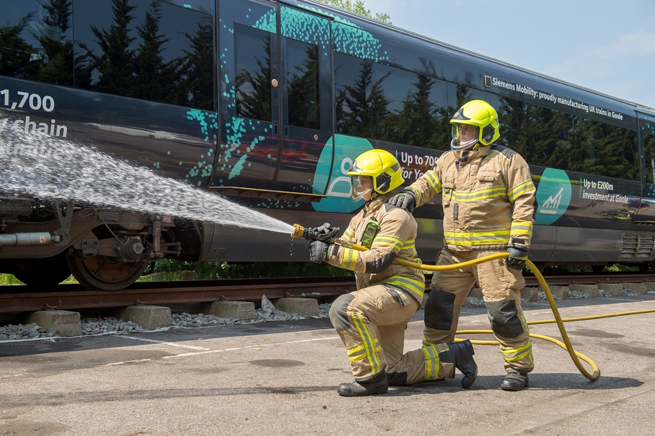 Image showing emergency services training on the newly donated carriage