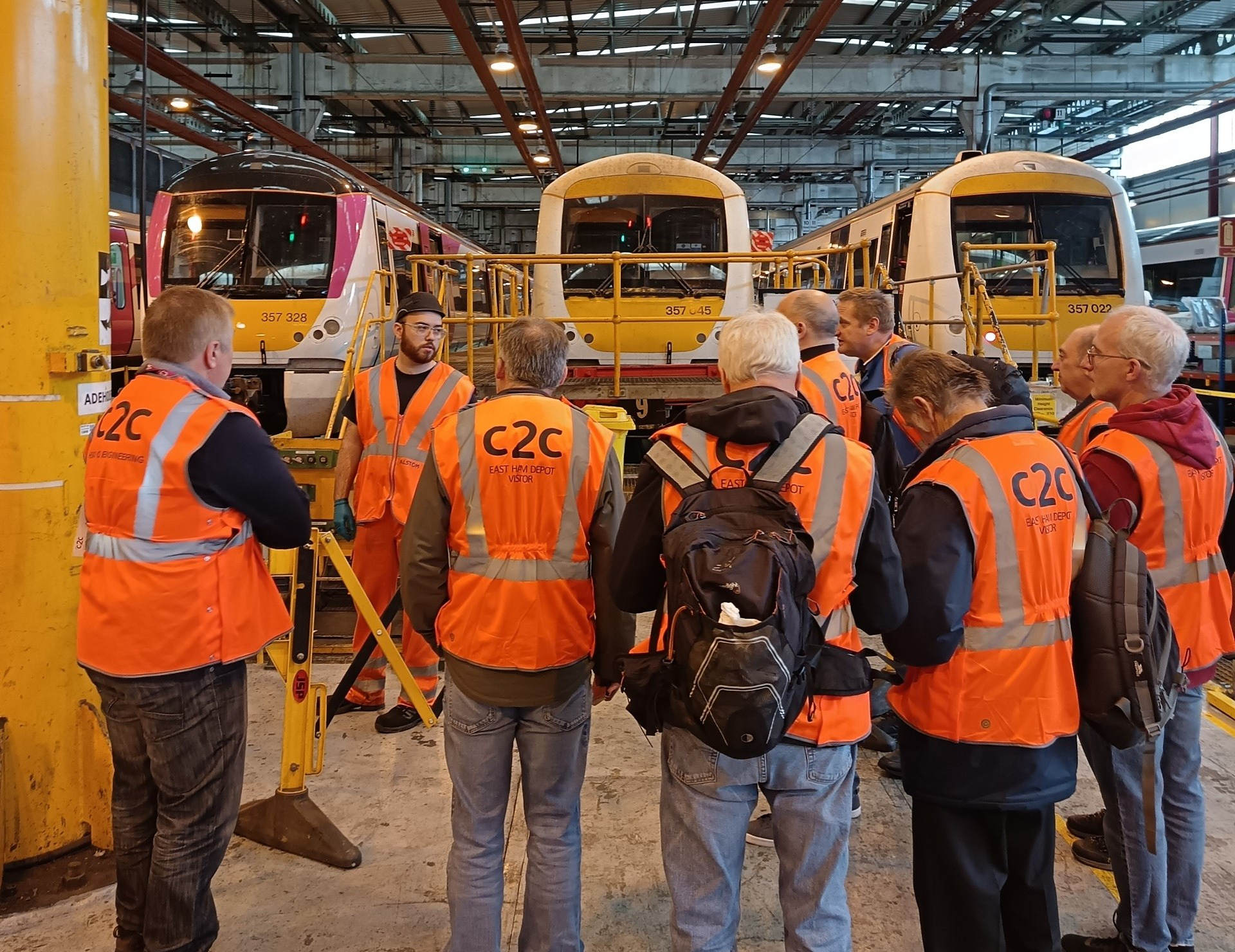 Image showing c2c competition winnders touring the depot at East Ham