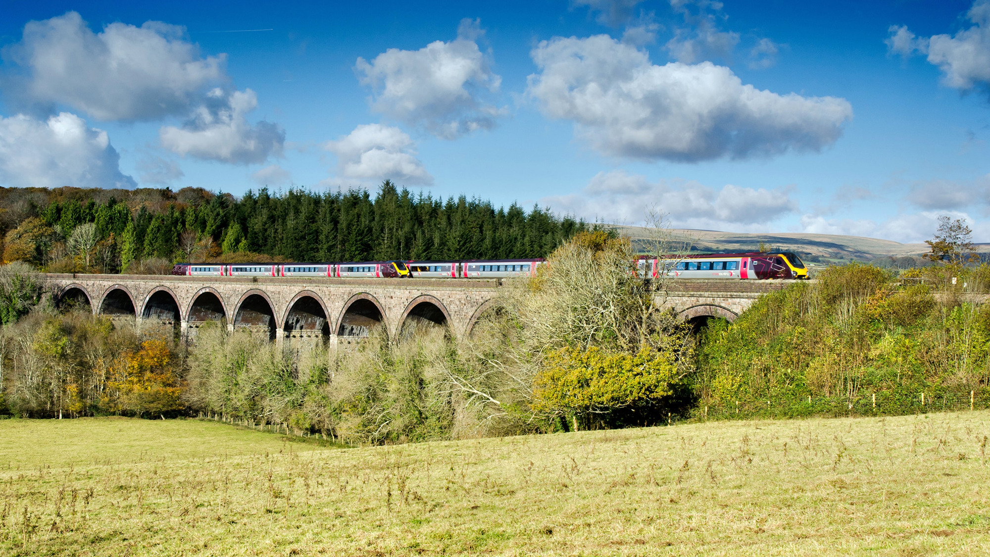 Image showing CrossCountry Voyager trains passing on a viaduct