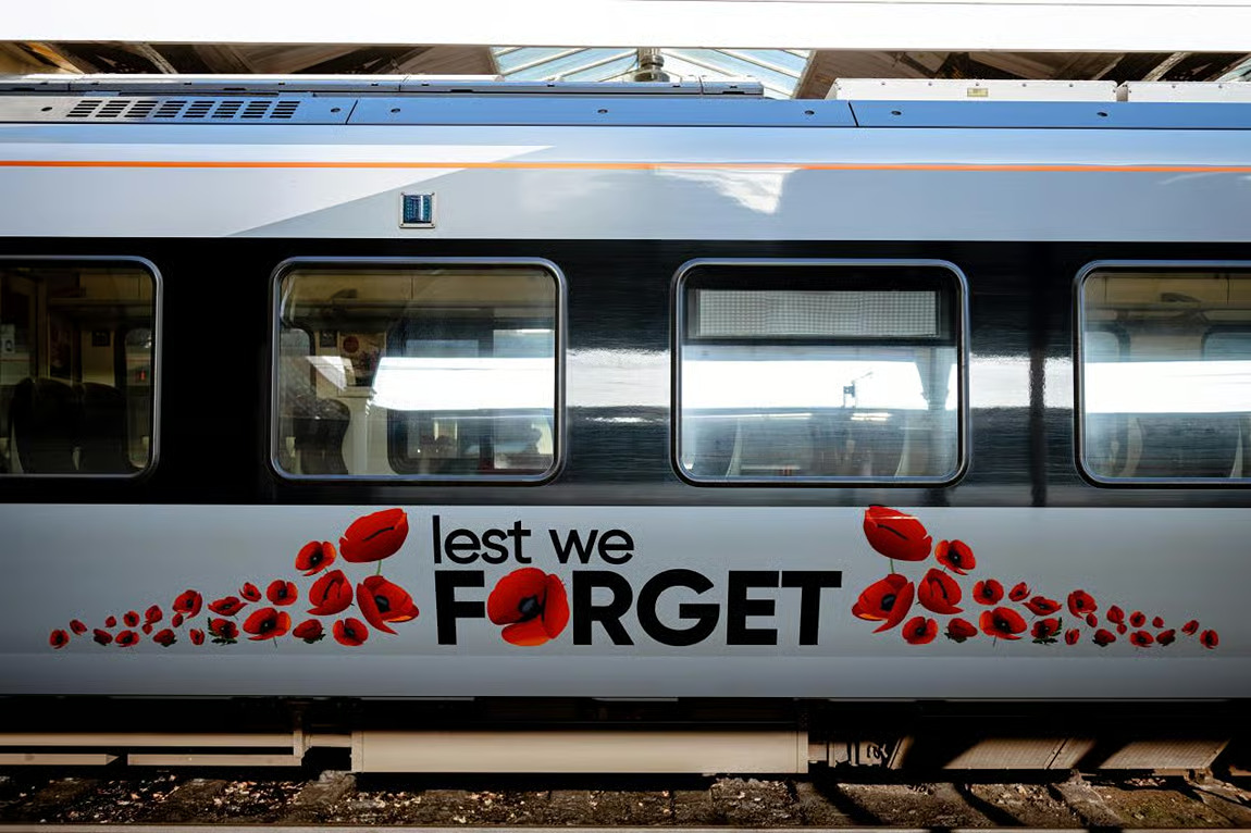 Image showing Greater Anglia train with 'Lest We Forget' decal