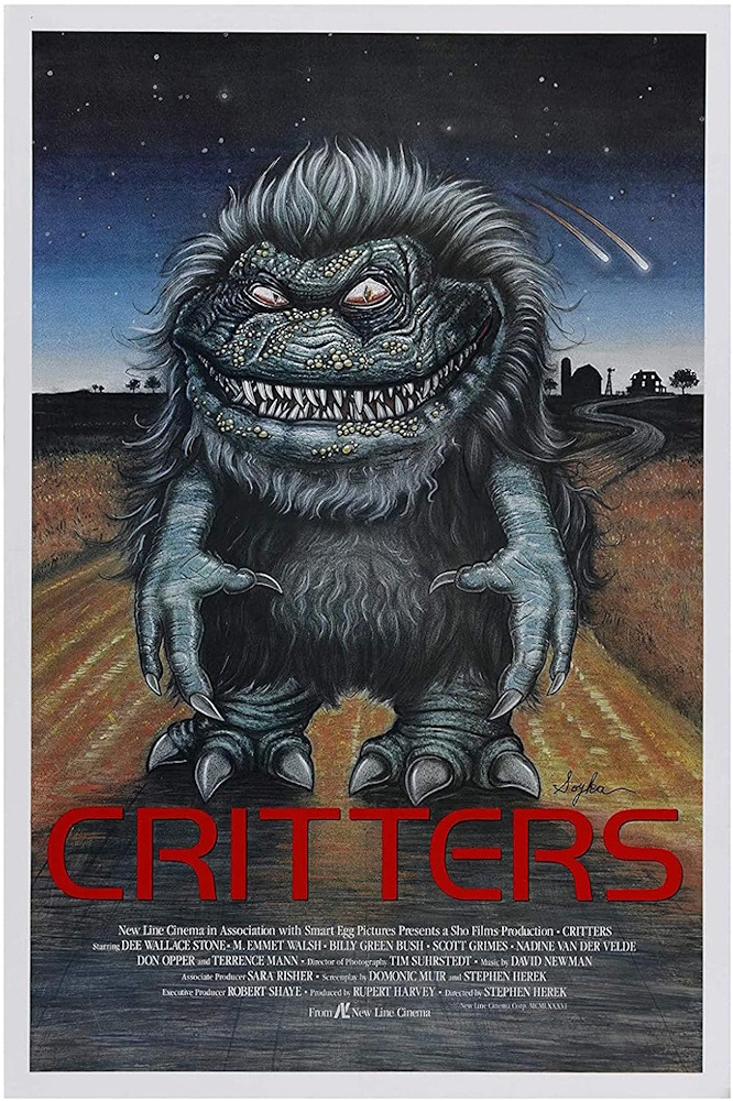 Movie poster for Critters (1986) featuring the small alien creatures and the film title