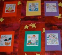 Mischievous Cat Christmas Cards ~ Seven Cross Stitch Charts