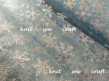 Blue Organza Fabric With Silver Snowflakes Sold Per Metre