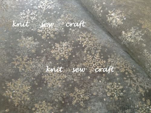 Organza Fabric With Silver Glitter Snowflakes Sold By The Metre