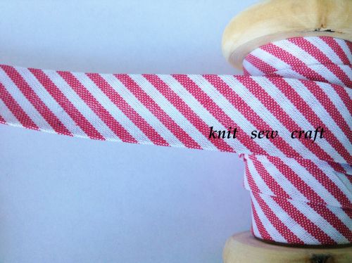 red and white spiral stripe bias 18mm candy cane print 1 metre byetsa