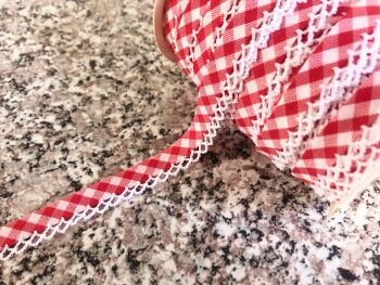red gingham bias fabric with white lace style trim