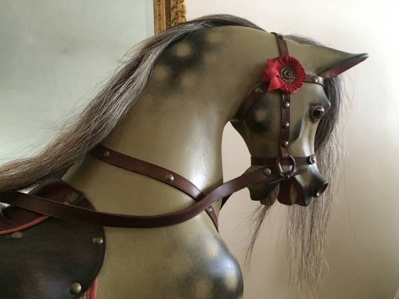 Note the feminine dish face & flared nostrils on the head of this restored G J Lines rocking horse.