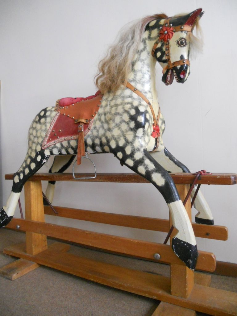 Vintage rocking horse by J Collinsons and son