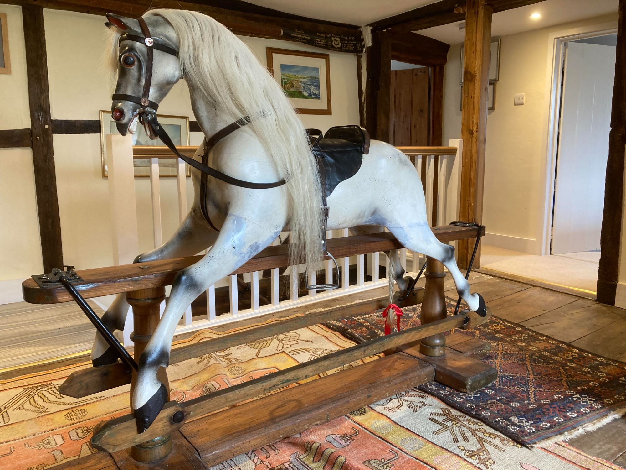 Antique rocking horse attributed to F H Ayres
