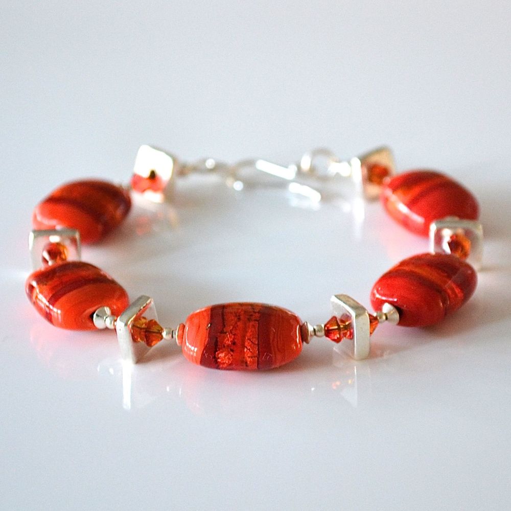 Red Glass and Silvered Ceramic Bracelet