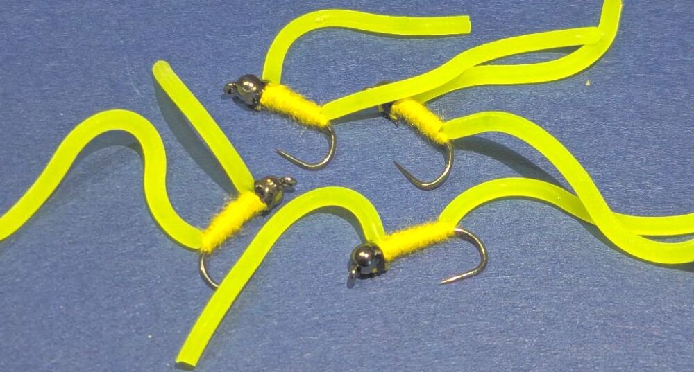 Squirmy Wormy ,FL yellow with a black head, barbless ,twin tailed BL 150