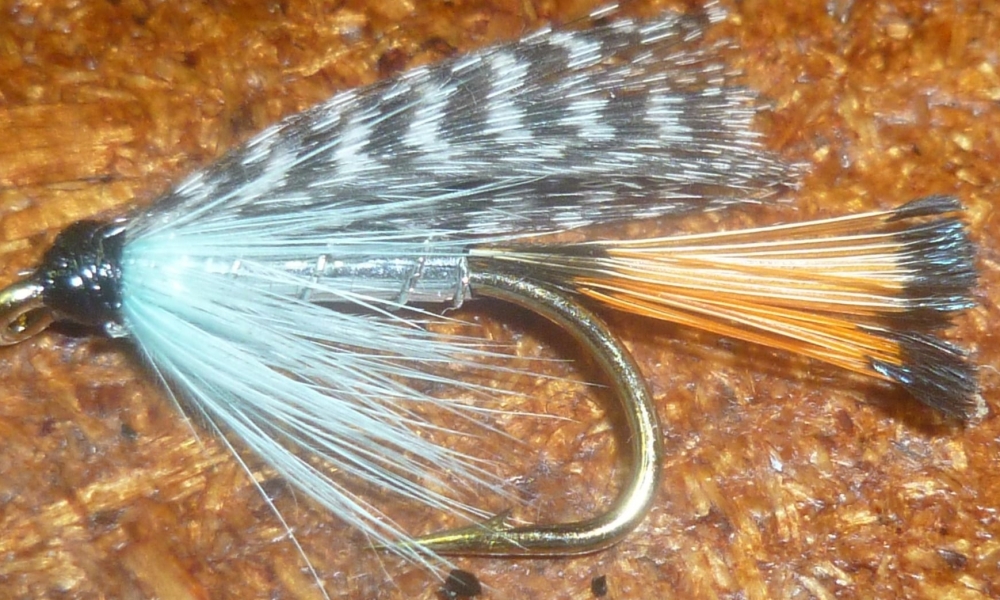 Teal Blue and Silver #12 barbed  (W23) wet fly