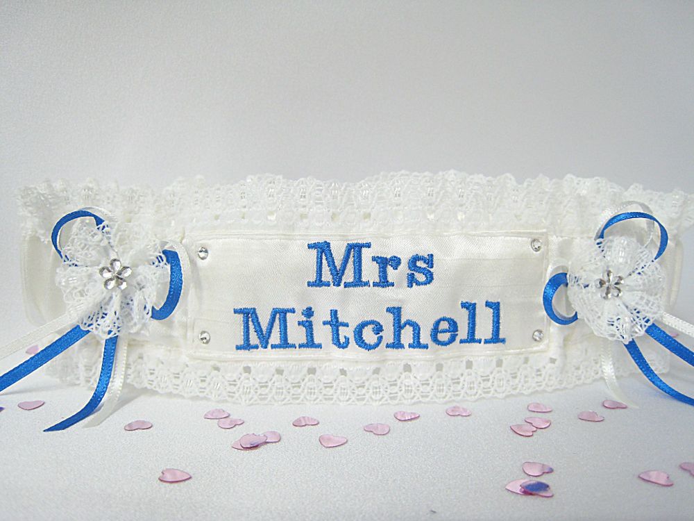 Satin Garter With Mrs Embroidered On The Front In Royal Blue Thread.