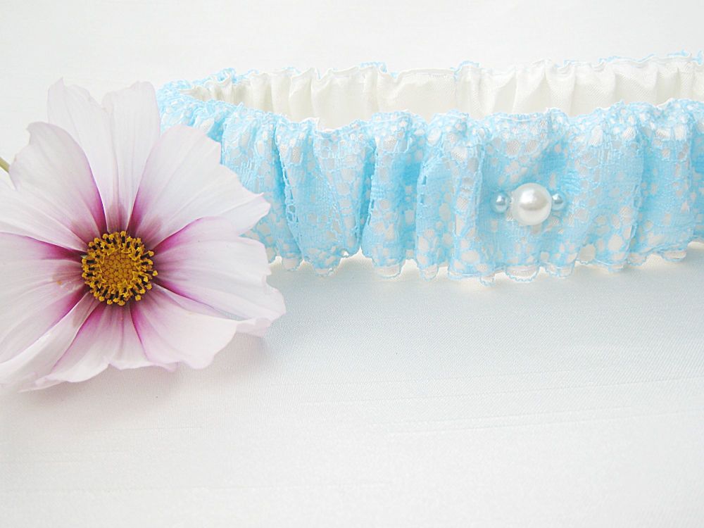 Ivory With Pale Blue Garter