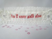 Liverpool garter which is embroidered with You’ll never walk alone.