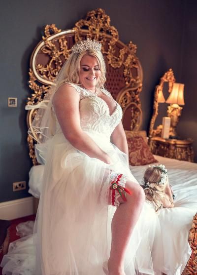 Bride showing off her'Bailey' garter