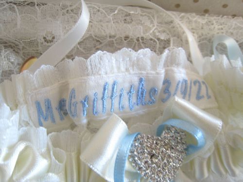Personalised Garters, Stitched In Blue Embroidery Thread
