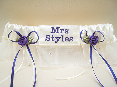 Ivory Wedding Garter With Brides New Name Stitched In Purple Thread