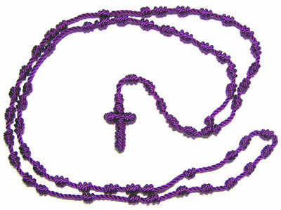 Knotted thread rosary beads in purple