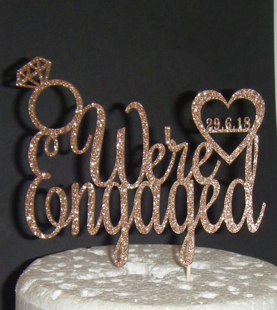 We're Engaged with ring and dated heart Cake Topper