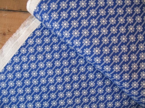 Ellen Luckett Baker Framework daisy chain in blue