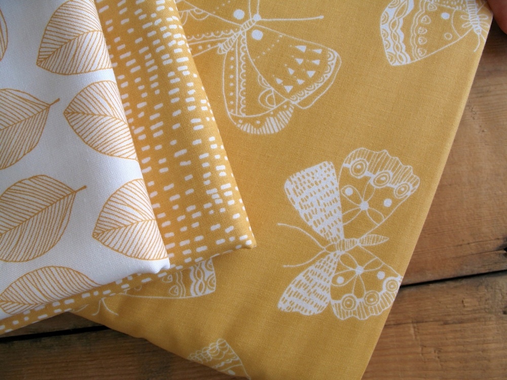 Victoria Johnson WHISPER bold butterfly on mustard