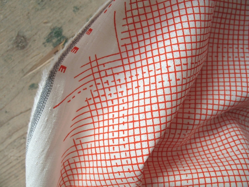 BOLT END - Carolyn Friedlander Euclid check it in tangerine on Essex LINEN