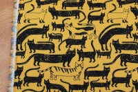 Japanese Kilkenny cats in black and yellow on heavier cotton 