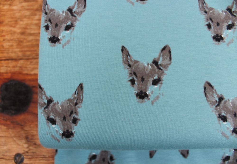 Dutch JERSEY fawns on blue