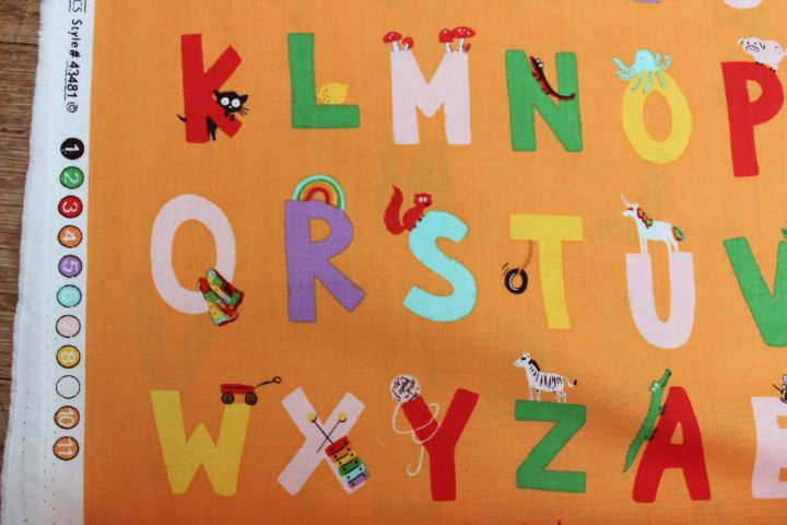 Heather Ross Kinder alphabet on orange