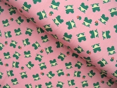 Kokka smiley frogs in heavy cotton on pink