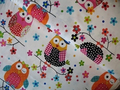 Stof owls on a date on white