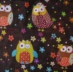 Stof owls on a date on brown