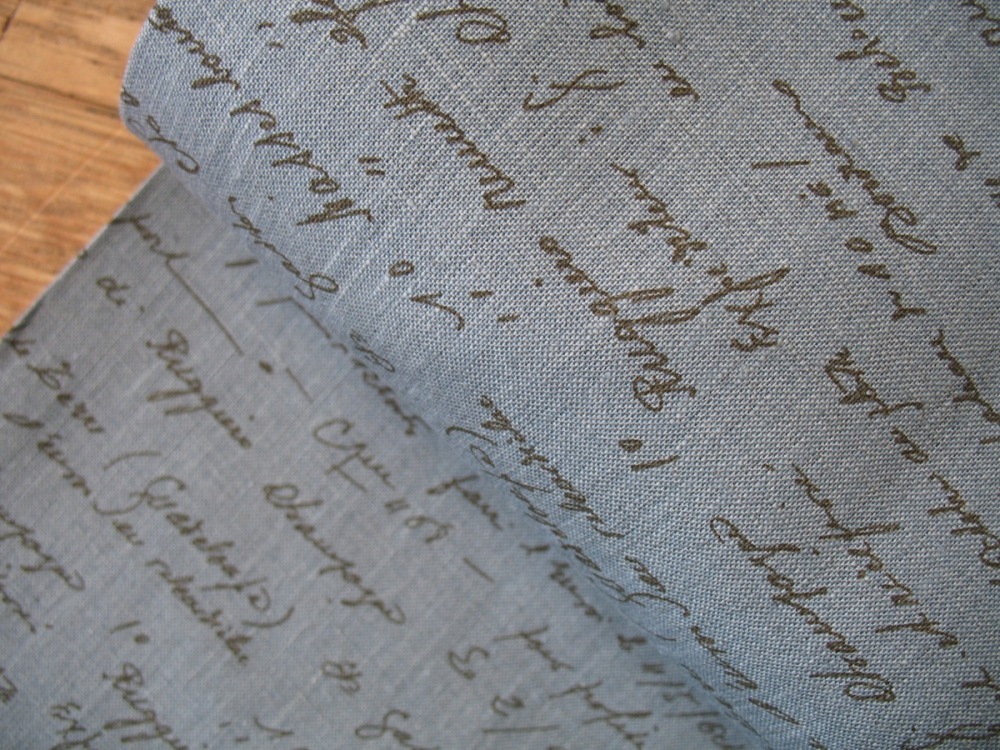 'La Couture' handwritten script in red pure linen on diesel blue (WIDE)