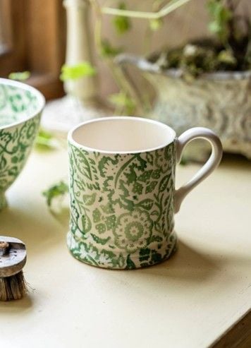 The Green Wallpaper Half Pint Mug has been inspired by Stafforshire pottery designs.