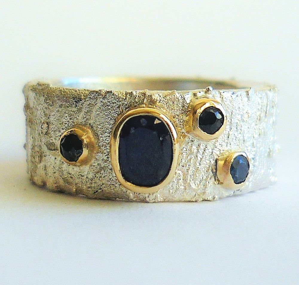 Four sapphire silver with gold ring