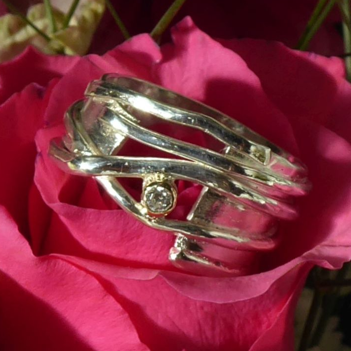 Alternative gold and silver diamond engagement ring