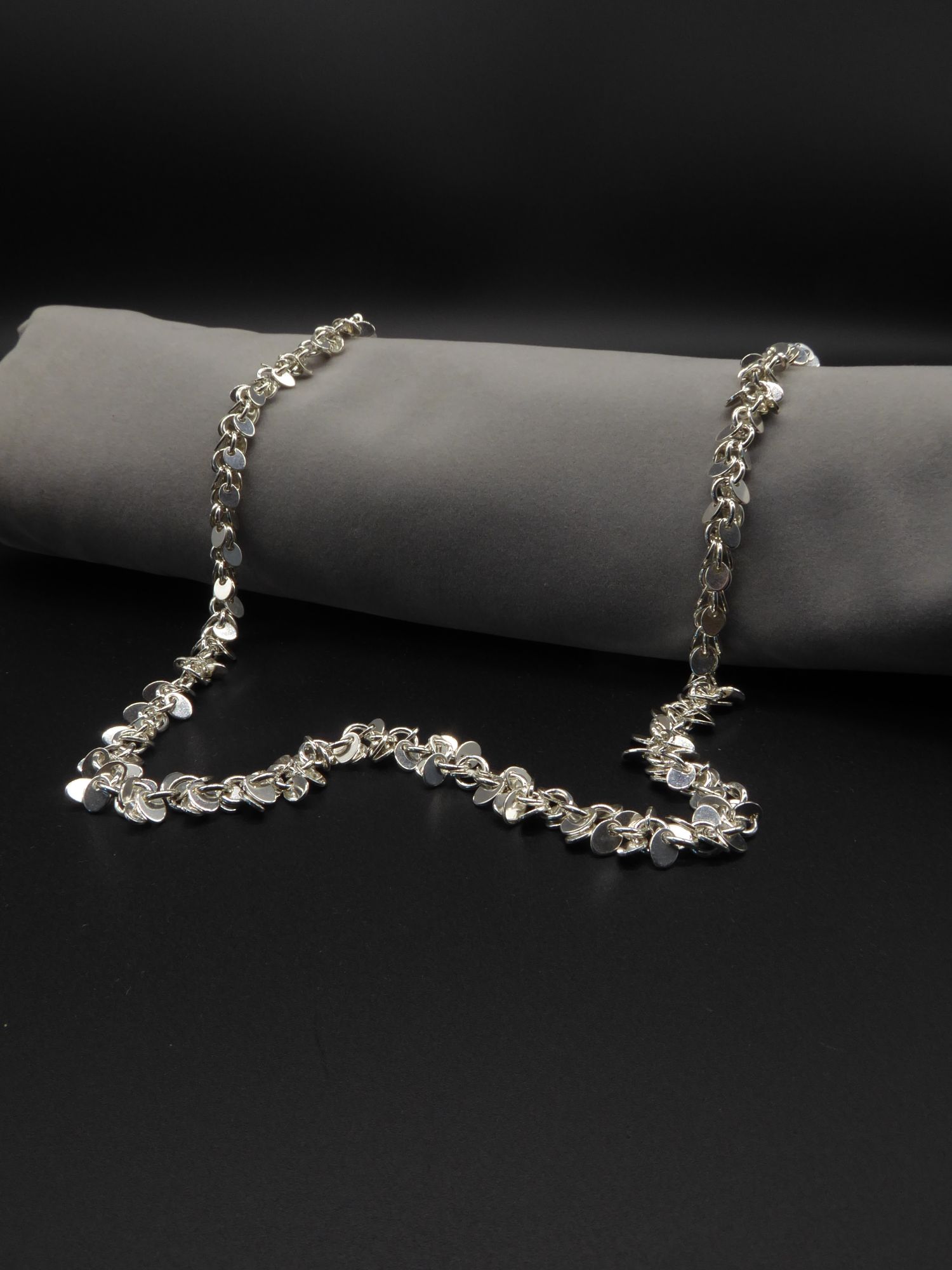 tassle contemporary silver necklace