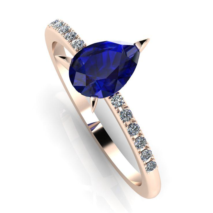Beautiful and unusual rose gold, and tear sapphire engagement ring