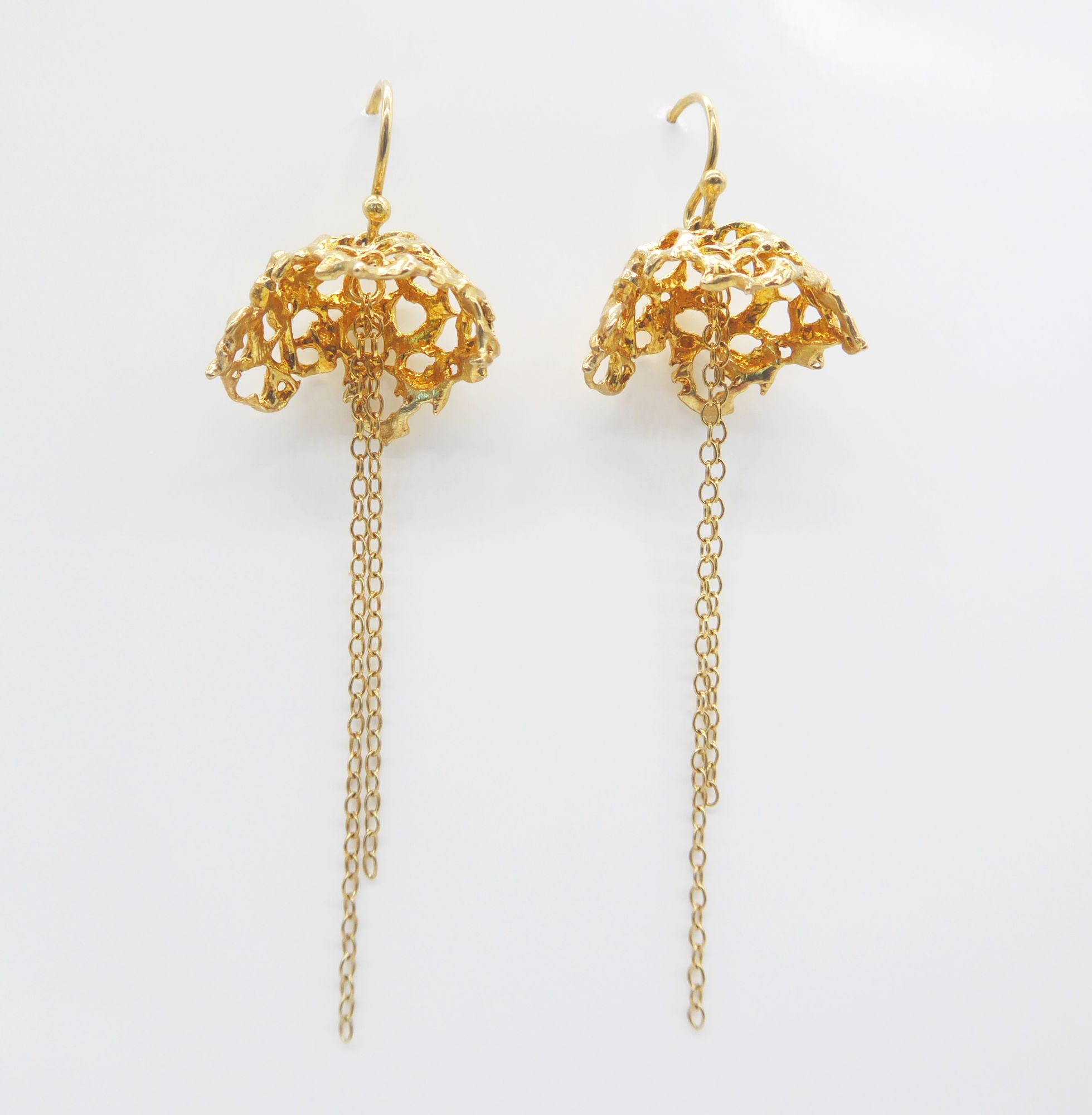Unusual gold web earrings