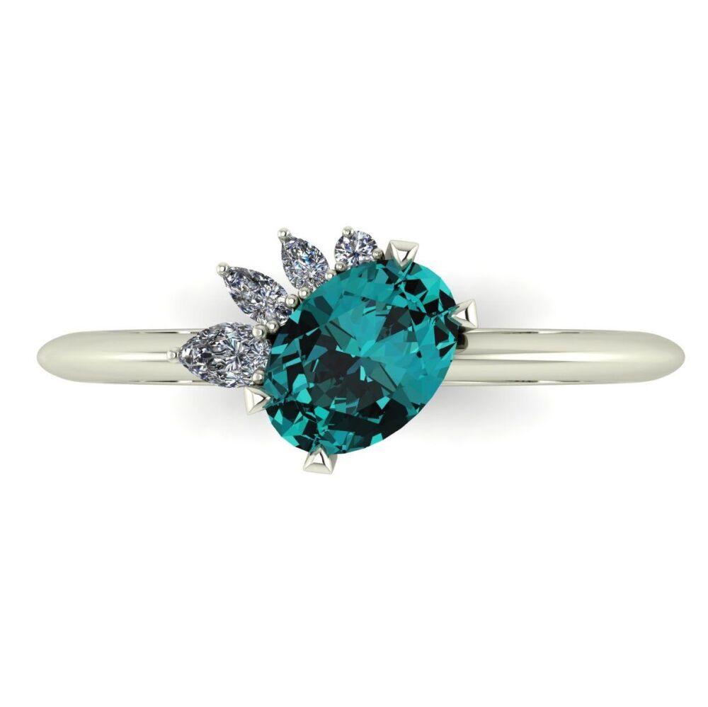 asymmetrical teal sapphire and diamond engagement ring 
