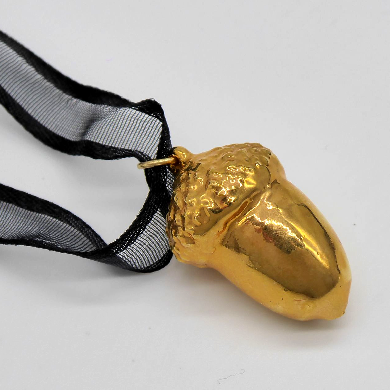 Dipped gold acorn pendant