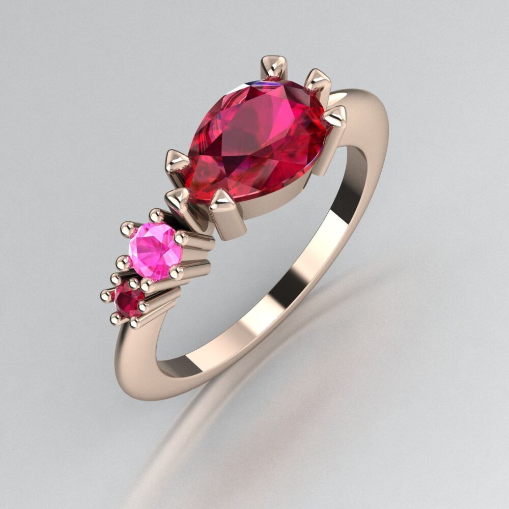Ruby's & Pink Sapphire Trilogy Comet Ring - Rose Gold