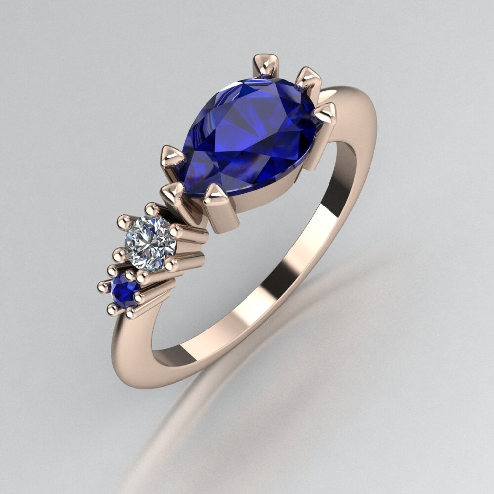 Sapphire's & Diamond Trilogy Comet Ring - Rose Gold