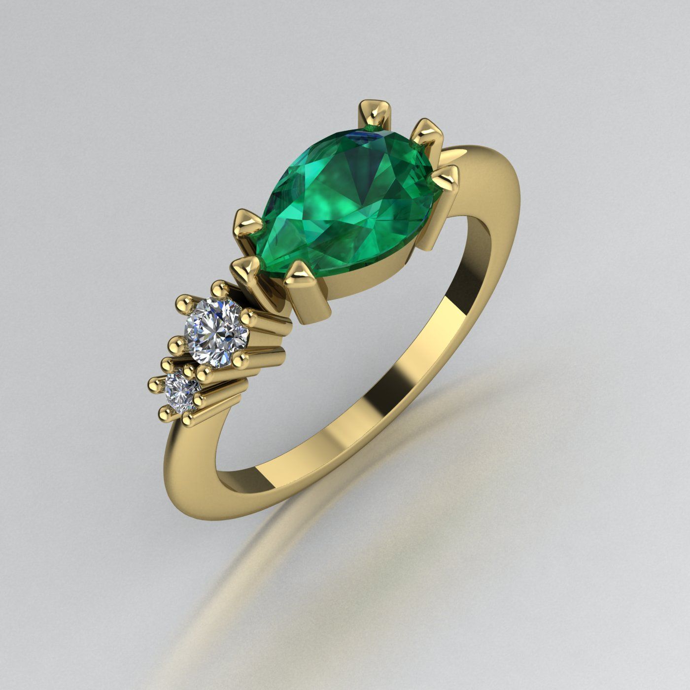 Emerald and dias comet ring.jpg