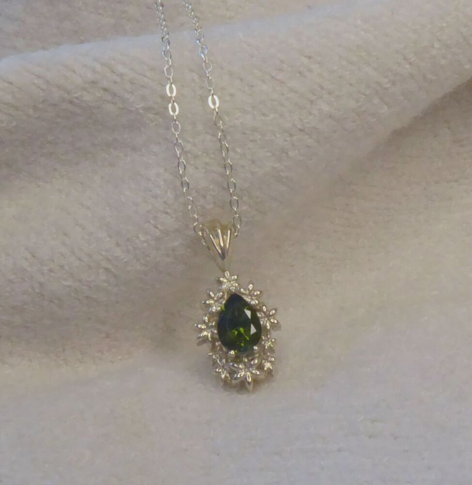 Fleur - Delicate Flower Patterned Silver Pendant Set With A Pear Shaped Green Tourmaline Gemstone