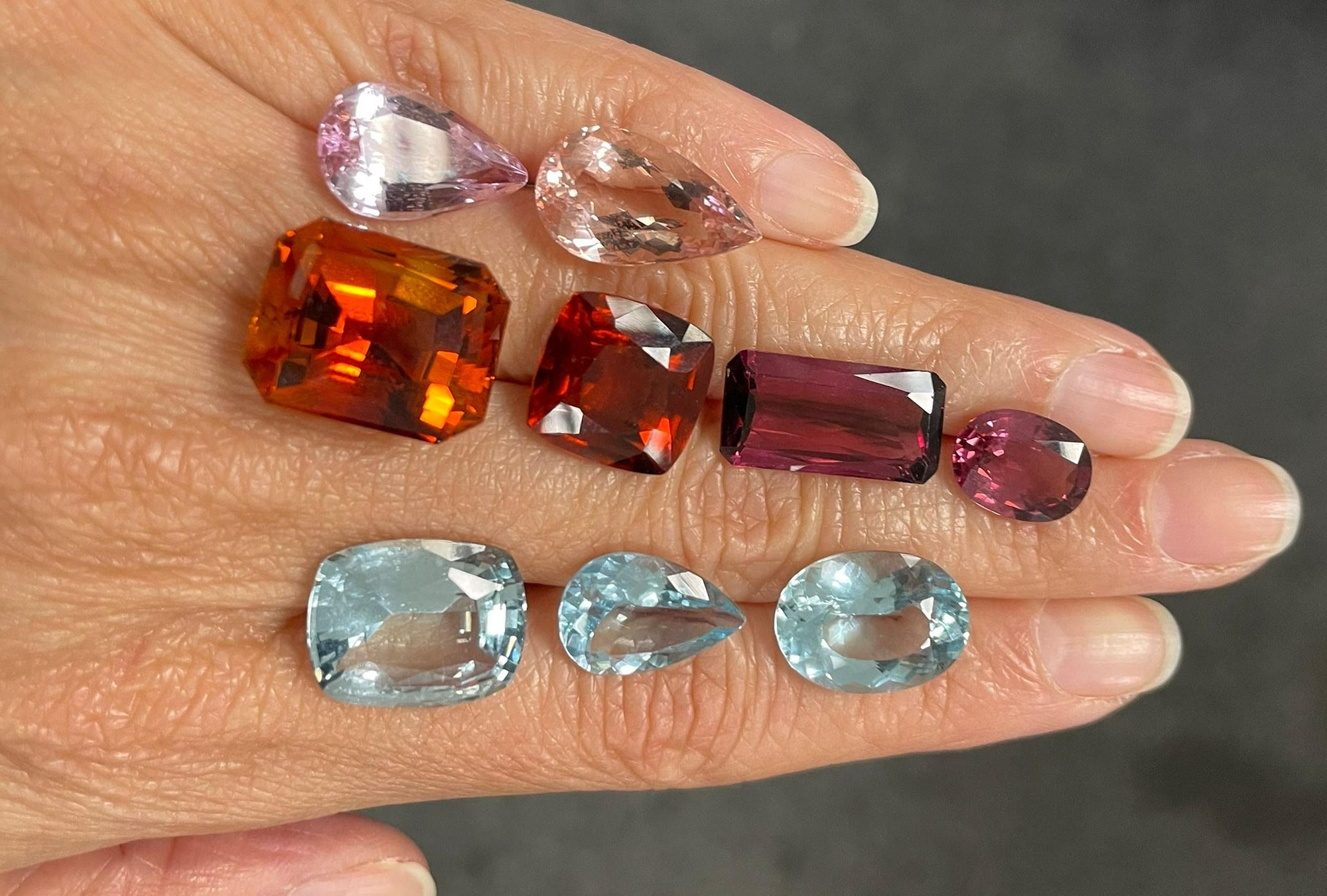 mixed gemstones on hand