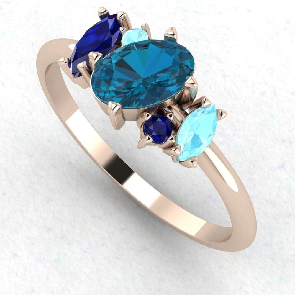 Atlantis Blue: London Blue Topaz Asymmetrical Cluster Ring - 18 Carat Rose Gold